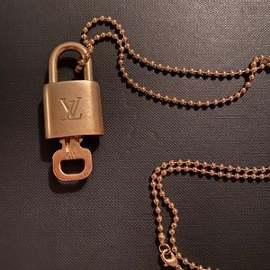 Authentic Louis Vuitton lock and key